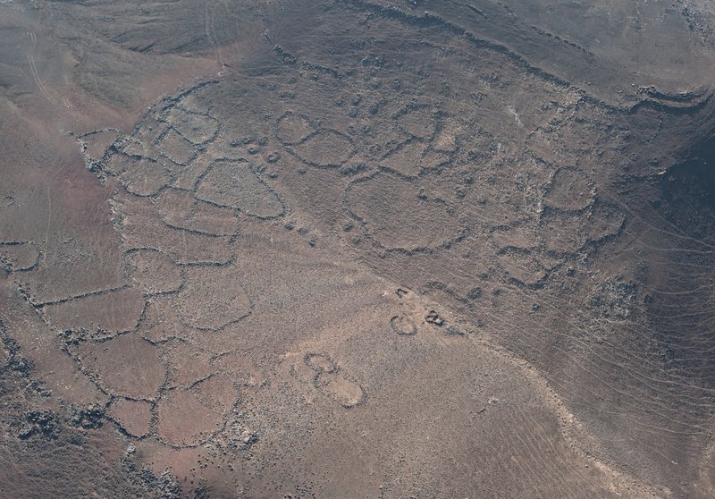 Aerial view on the garden terraces in the crater of the Tulul al-Ghusayn vulcano