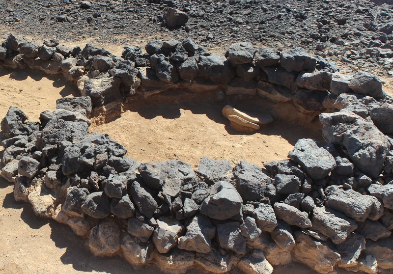 Excavated dwelling in Tulul al-Ghusayn with grinding slabs in situ